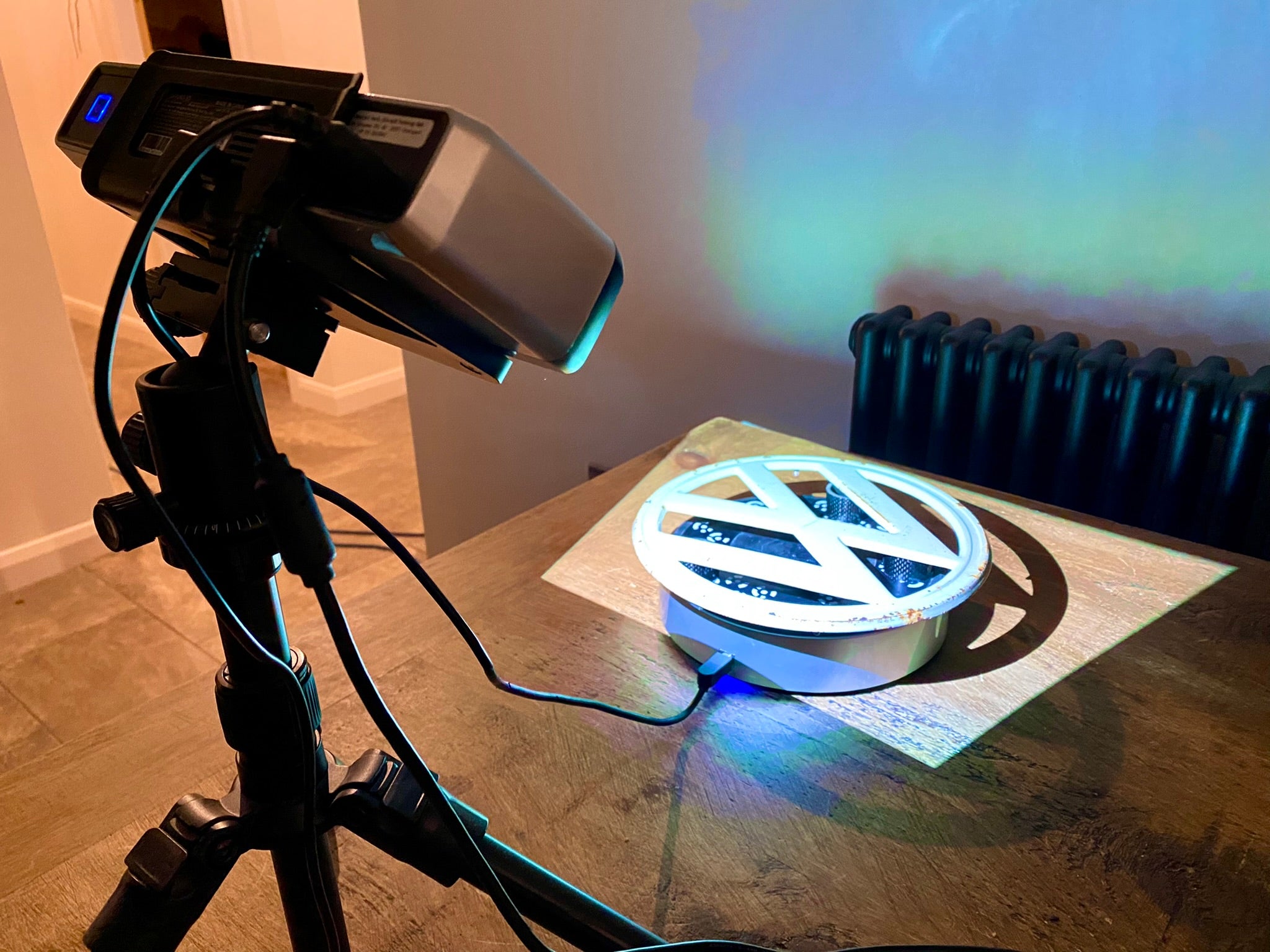 MagCAD Designs 3D scanning a VW Campervan badge.